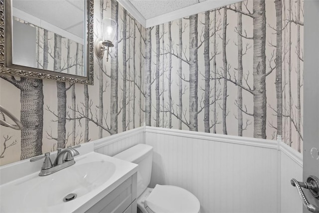 287 Rankin Rd, Belle Vernon, PA 15012 - bathroom featuring wainscoting, wallpapered walls, and vanity