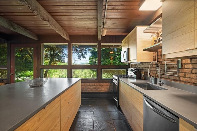 287 Rankin Rd, Belle Vernon, PA 15012 - kitchen featuring stainless steel dishwasher, range with gas cooktop, stone tile flooring, a wooden ceiling with exposed beams, and light brown cabinets