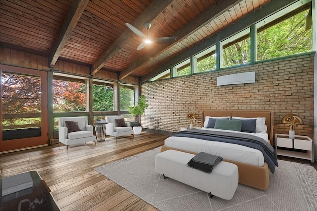 287 Rankin Rd, Belle Vernon, PA 15012 - bedroom with brick wall, hardwood / wood-style floors, wood ceiling, and an AC wall unit