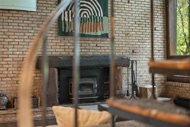 287 Rankin Rd, Belle Vernon, PA 15012 - detailed view of brick wall and a wood stove