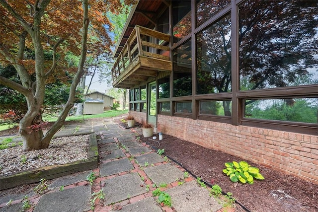 287 Rankin Rd, Belle Vernon, PA 15012 - view of side of home with brick siding and an outbuilding