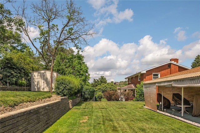 4636 Bowes Ave, West Mifflin, PA 15122 - view of grassy yard featuring a shed and a patio
