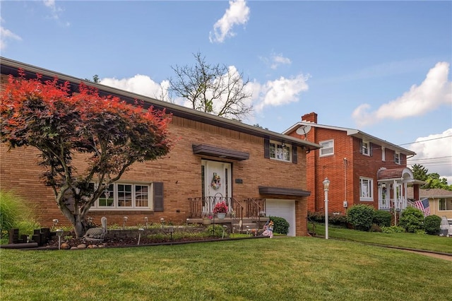 4636 Bowes Ave, West Mifflin, PA 15122 - raised ranch with a chimney, a garage, a front lawn, and brick siding