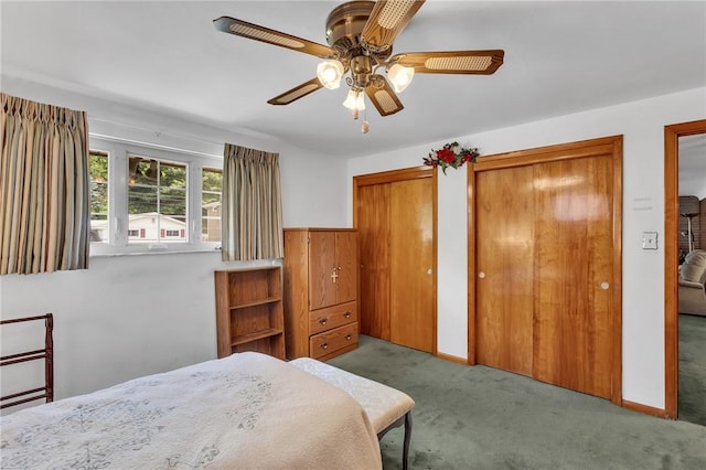 4636 Bowes Ave, West Mifflin, PA 15122 - bedroom featuring multiple closets, carpet, a ceiling fan, and a wainscoted wall