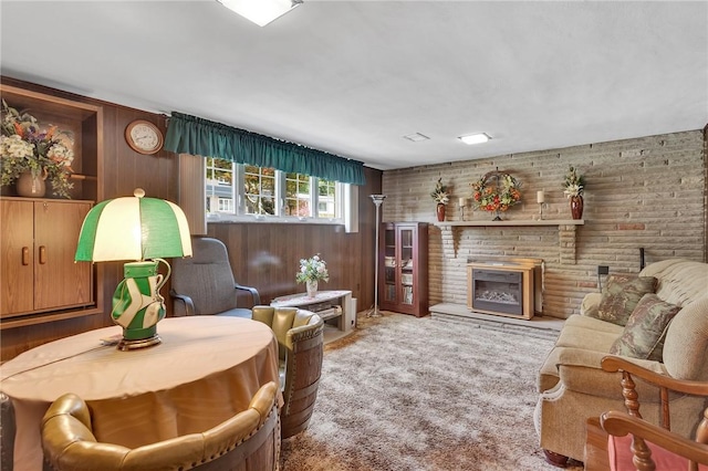 4636 Bowes Ave, West Mifflin, PA 15122 - carpeted living area featuring a fireplace and wood walls