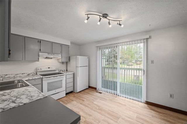 305 Laporte Ct, Cranberry Twp, PA 16066 - kitchen with white appliances, under cabinet range hood, gray cabinets, light wood-style floors, and a textured ceiling