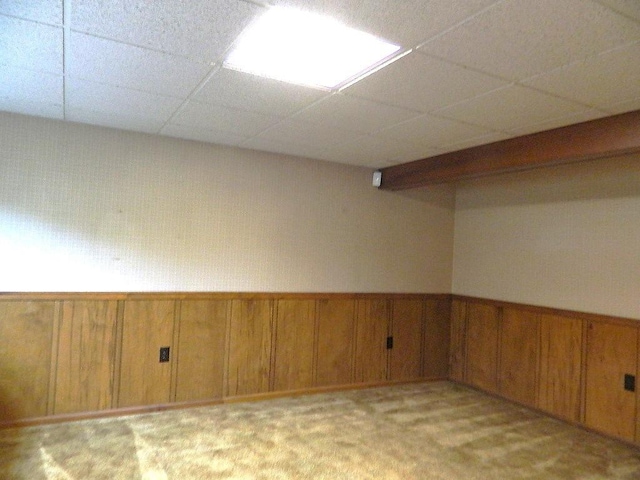 115 Lowery Dr, Middlesex Twp, PA 16059 - empty room featuring a wainscoted wall, a paneled ceiling, and light colored carpet