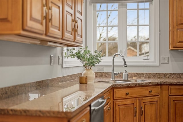 1011 Lakeside Dr, Mount Pleasant Twp Was, PA 15057 - kitchen featuring brown cabinetry and dark stone counters