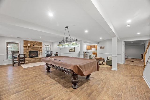1011 Lakeside Dr, Mount Pleasant Twp Was, PA 15057 - recreation room featuring light wood-style flooring, billiards, a stone fireplace, and recessed lighting