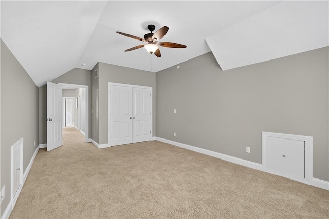 201 Venango Trl, Marshall, PA 16046 - unfurnished bedroom featuring light colored carpet, vaulted ceiling, a closet, and ceiling fan