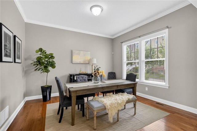 201 Venango Trl, Marshall, PA 16046 - dining room featuring wood finished floors and crown molding