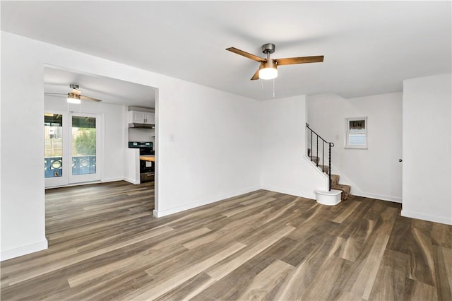 103 Church Ave, Mount Oliver, PA 15210 - unfurnished room with a ceiling fan, wood finished floors, and stairway