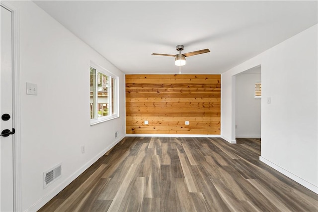 103 Church Ave, Mount Oliver, PA 15210 - unfurnished room featuring ceiling fan, wood finished floors, and wooden walls