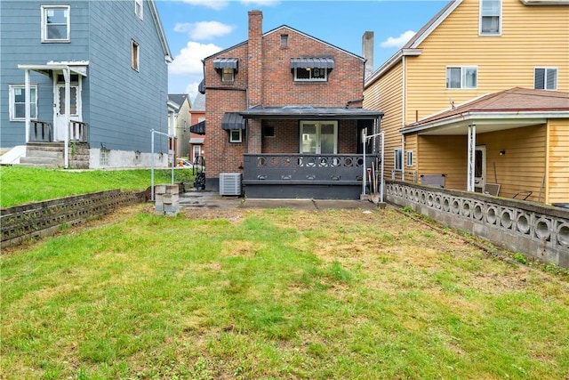 103 Church Ave, Mount Oliver, PA 15210 - back of house featuring brick siding and a yard