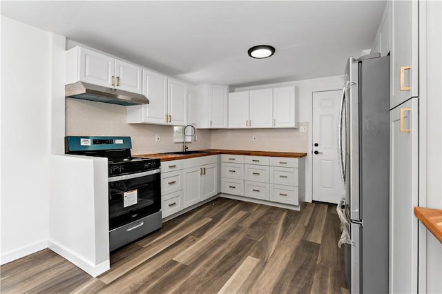 103 Church Ave, Mount Oliver, PA 15210 - kitchen with under cabinet range hood, stainless steel appliances, and butcher block countertops