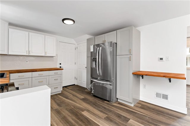 103 Church Ave, Mount Oliver, PA 15210 - kitchen featuring stainless steel fridge, wooden counters, dark wood-style flooring, and tasteful backsplash