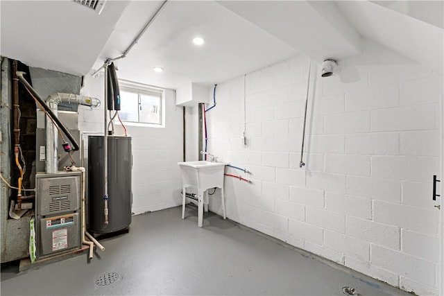 103 Church Ave, Mount Oliver, PA 15210 - below grade area featuring water heater and a sink