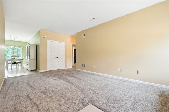 31 Elena Ave, Lower Burrell, PA 15068 - spare room with light carpet and a chandelier