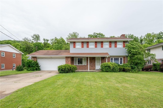 206 Bonnie St, Rostraver, PA 15012 - view of front of property featuring brick siding, an attached garage, a front lawn, and concrete driveway