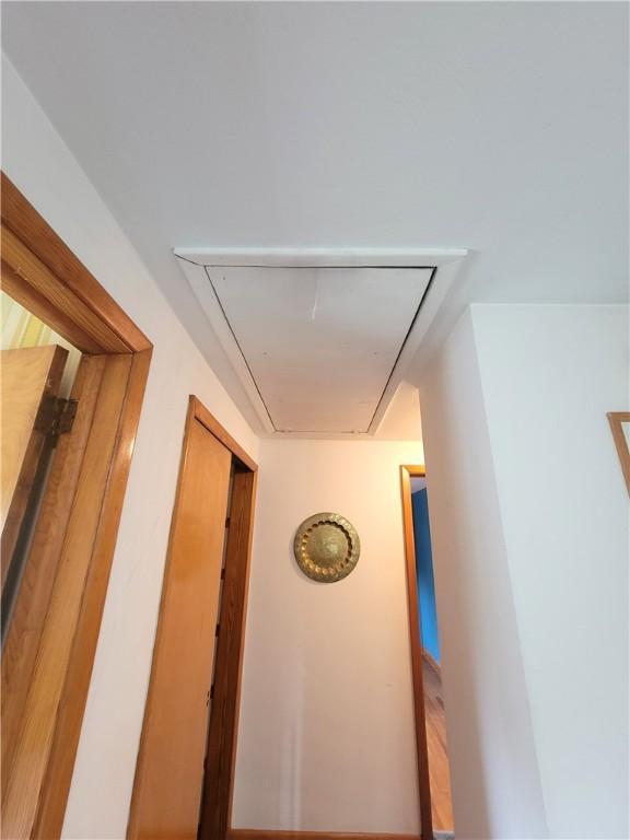 1176 Colgate Dr, Monroeville, PA 15146 - corridor featuring attic access