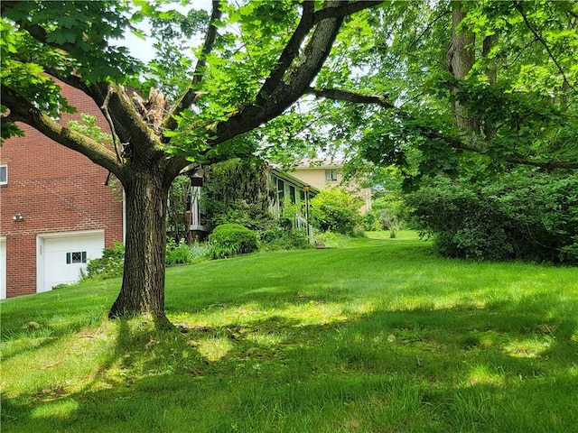 1176 Colgate Dr, Monroeville, PA 15146 - view of green lawn featuring a garage