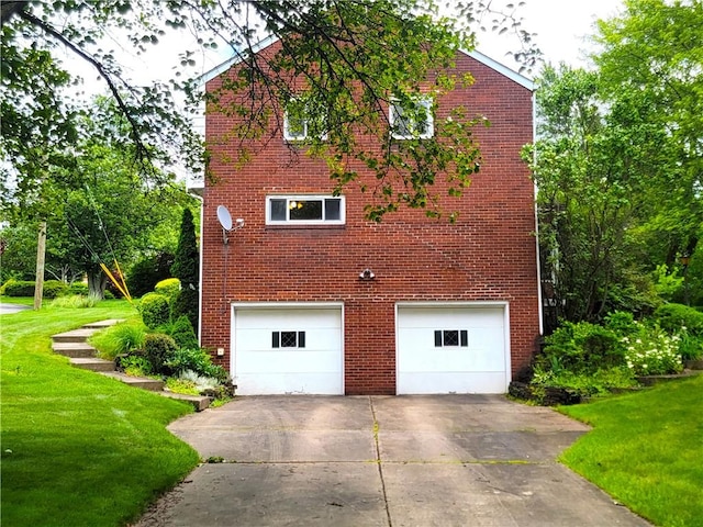 1176 Colgate Dr, Monroeville, PA 15146 - view of home's exterior featuring a garage, brick siding, concrete driveway, and a lawn