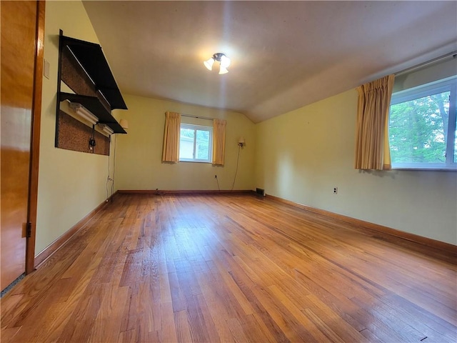 1176 Colgate Dr, Monroeville, PA 15146 - unfurnished room with hardwood / wood-style flooring and vaulted ceiling