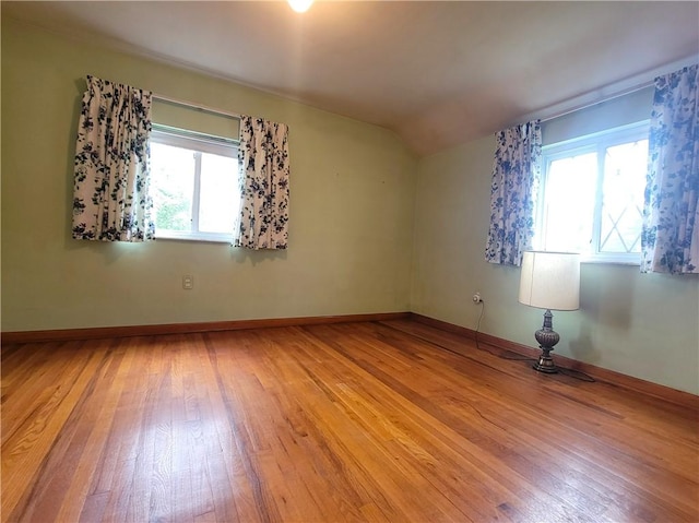 1176 Colgate Dr, Monroeville, PA 15146 - unfurnished room featuring light wood finished floors, healthy amount of natural light, and vaulted ceiling
