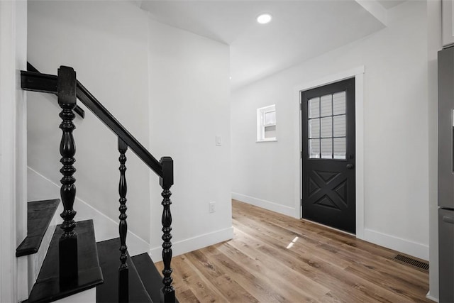 141 Blackhawk St, Squirrel Hill, PA 15218 - foyer featuring light wood finished floors, recessed lighting, and stairs