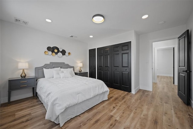 141 Blackhawk St, Squirrel Hill, PA 15218 - bedroom with a closet, wood finished floors, and recessed lighting