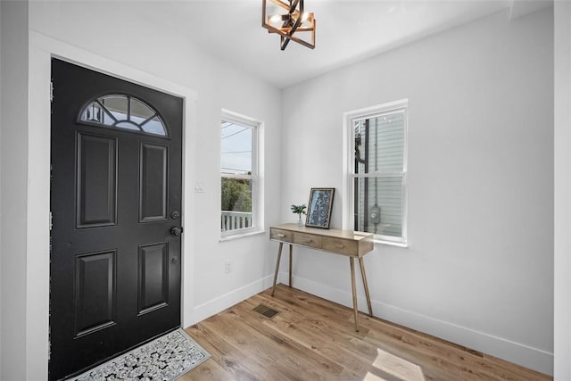 141 Blackhawk St, Squirrel Hill, PA 15218 - entrance foyer featuring a chandelier and light wood-style floors