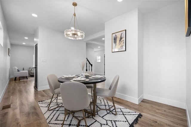 141 Blackhawk St, Squirrel Hill, PA 15218 - dining space with a chandelier, wood finished floors, and recessed lighting