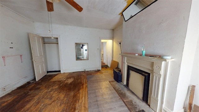 237 Wick St, Hill District, PA 15219 - unfurnished living room with wood finished floors, ceiling fan, and a fireplace