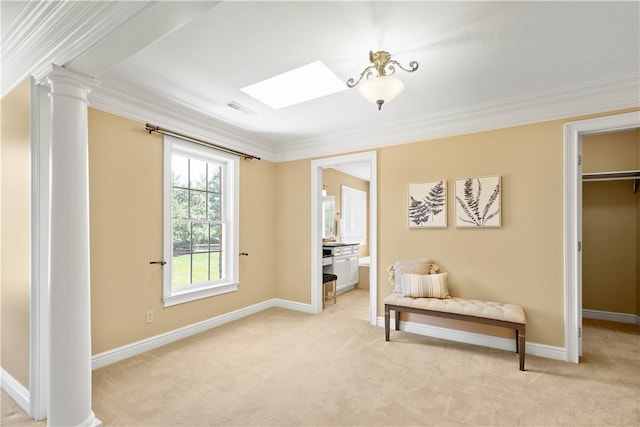 8010 Sherwood Dr, Collier Twp, PA 15142 - sitting room with light carpet, ornamental molding, a skylight, and decorative columns