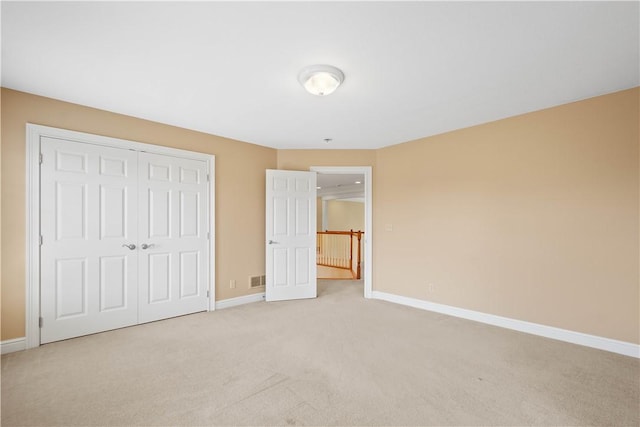 8010 Sherwood Dr, Collier Twp, PA 15142 - unfurnished bedroom featuring light colored carpet and a closet