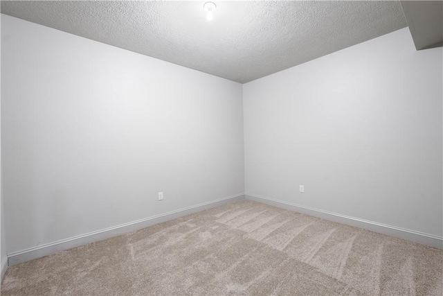 8010 Sherwood Dr, Collier Twp, PA 15142 - empty room featuring carpet and a textured ceiling
