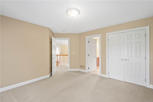 8010 Sherwood Dr, Collier Twp, PA 15142 - unfurnished bedroom featuring light carpet and a closet