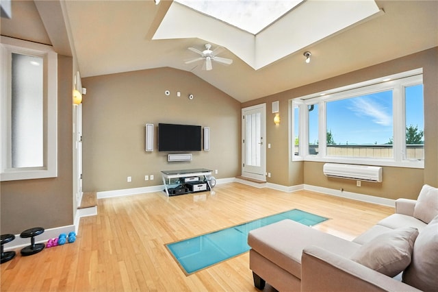 140 N Woodland Rd, Shadyside, PA 15232 - living room featuring wood finished floors, a wall unit AC, ceiling fan, and vaulted ceiling