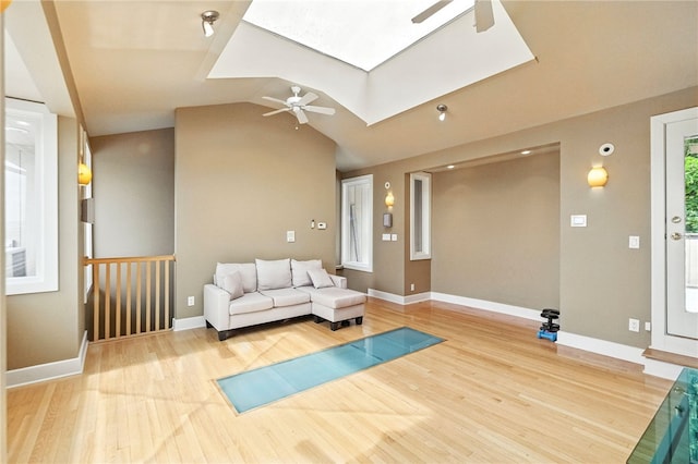 140 N Woodland Rd, Shadyside, PA 15232 - workout area featuring ceiling fan, a skylight, wood finished floors, and vaulted ceiling