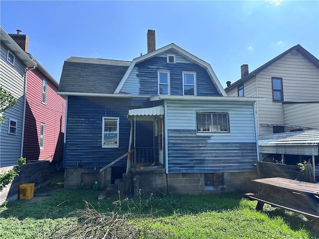 302 Franklin Ave, Applewold, PA 16201 - back of house featuring a gambrel roof and a chimney