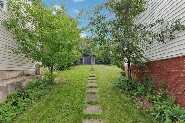 3130 Dobson St, Polish Hill, PA 15219 - view of grassy yard featuring a storage shed