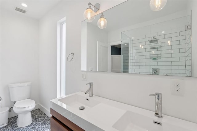 3130 Dobson St, Polish Hill, PA 15219 - bathroom with double vanity, tiled shower, and tile patterned flooring