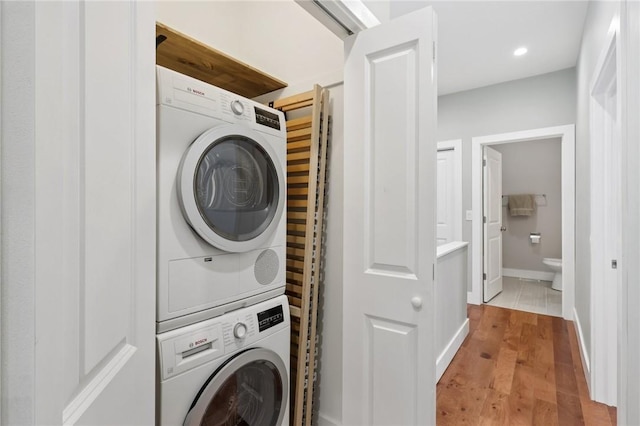 3130 Dobson St, Polish Hill, PA 15219 - washroom with estacked washer and dryer and light wood-type flooring