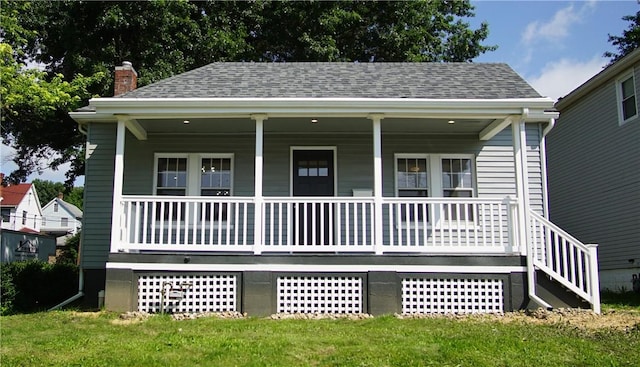 801 9th Ave, Brackenridge, PA 15014 - view of front facade featuring covered porch, roof with shingles, and a chimney