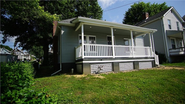 801 9th Ave, Brackenridge, PA 15014 - view of front of home with covered porch and a front lawn