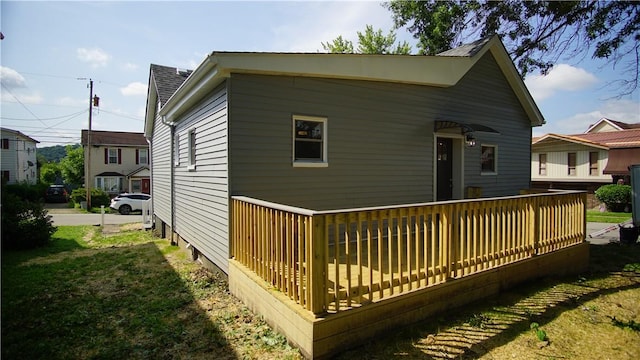 801 9th Ave, Brackenridge, PA 15014 - rear view of property featuring a wooden deck and a lawn