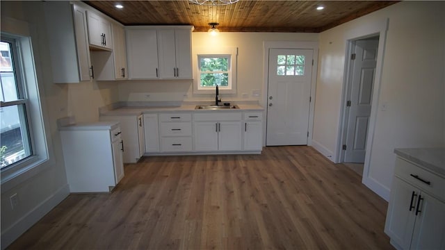 801 9th Ave, Brackenridge, PA 15014 - kitchen with wood ceiling, recessed lighting, light wood finished floors, white cabinetry, and light countertops