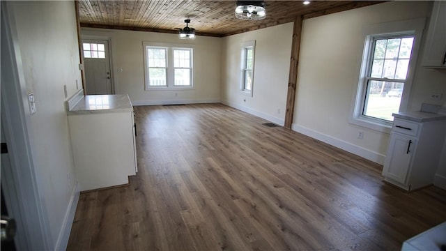801 9th Ave, Brackenridge, PA 15014 - unfurnished dining area with dark wood-style flooring and ornamental molding