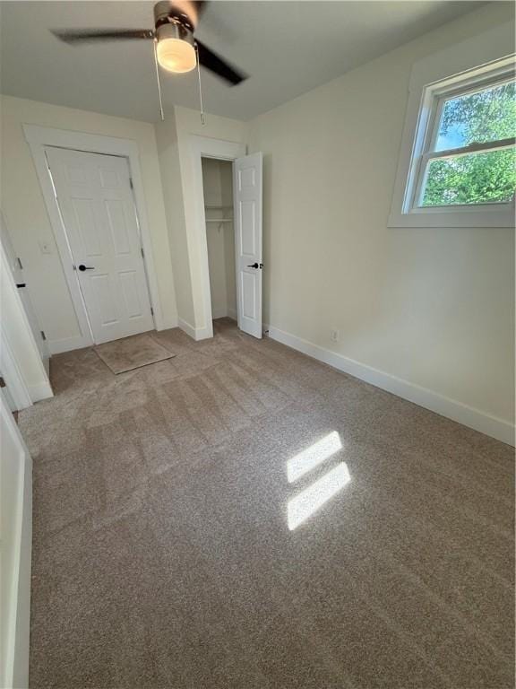 801 9th Ave, Brackenridge, PA 15014 - unfurnished bedroom featuring light carpet, a closet, and a ceiling fan