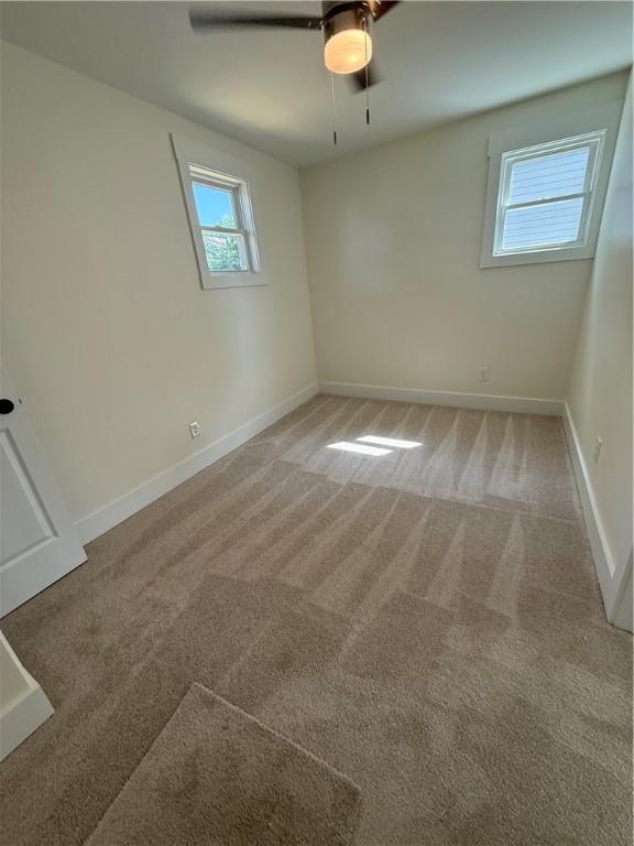 801 9th Ave, Brackenridge, PA 15014 - unfurnished room with carpet and a ceiling fan